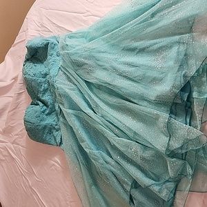 Sparkly green prom dress.